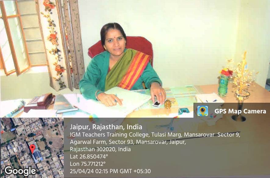 A member of staff at work at a desk in the office