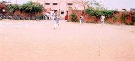 Students playing outdoor games on the college ground