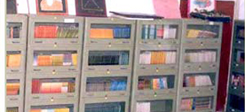The college library with its shelves of books