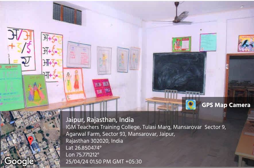 A classroom with teaching charts pinned to the wall